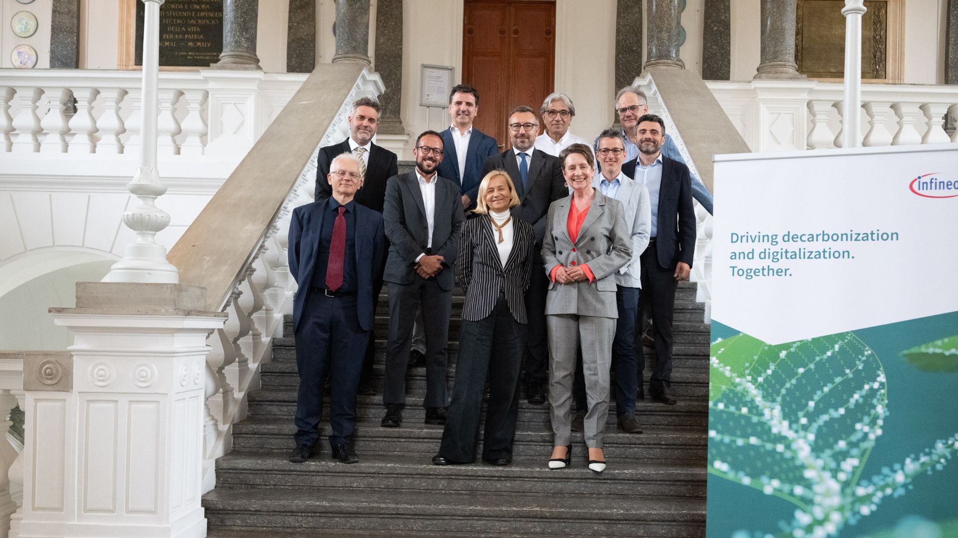 Group photo of the signatories of the agreement
